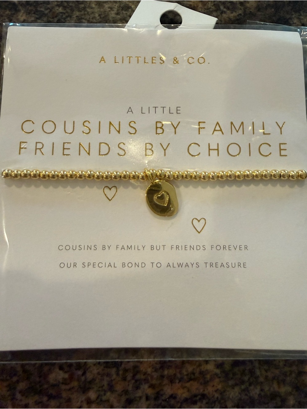 Cousins bracelet - gold tone NEW in package